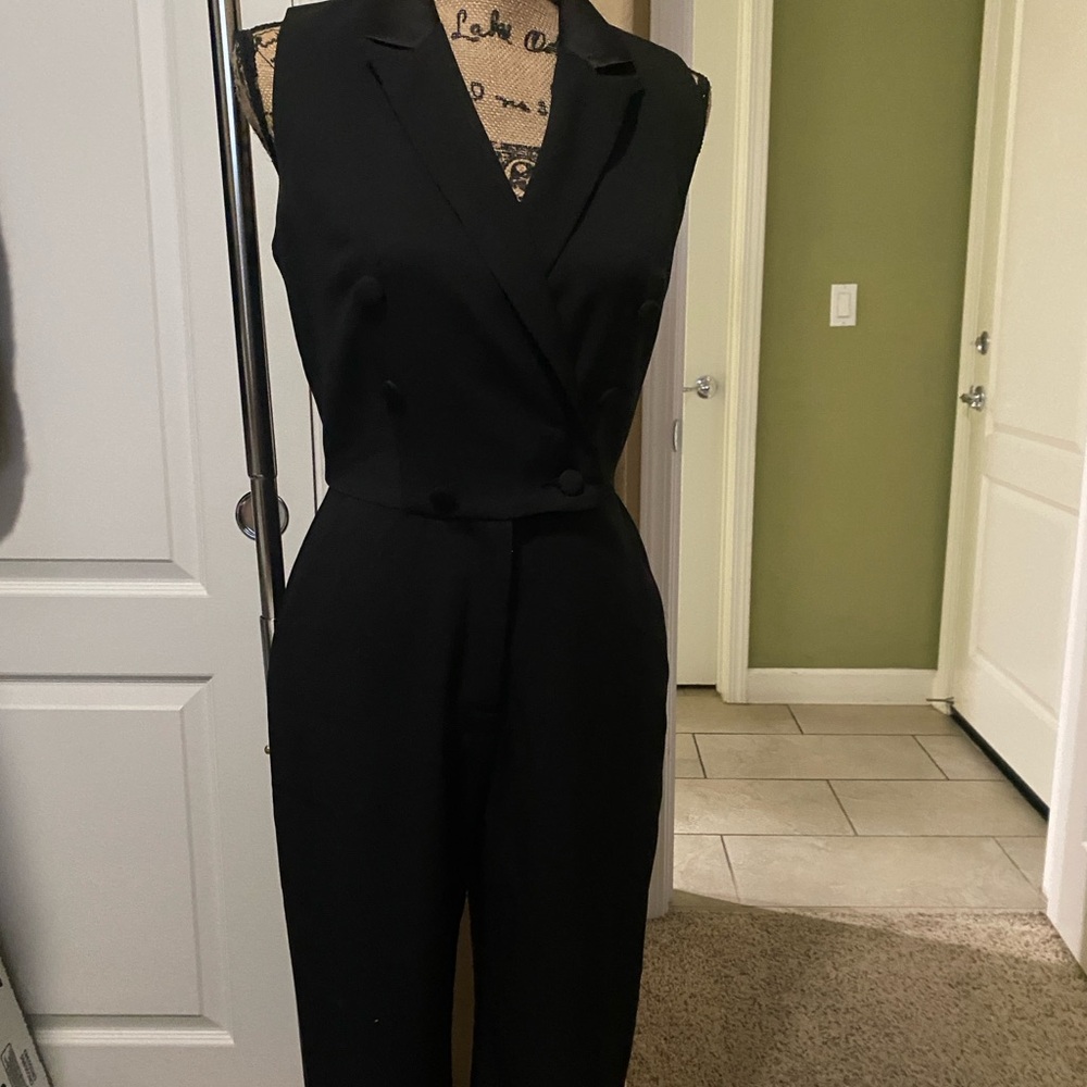 Adelyn Rae Black Elegant Jumpsuit with V-Neckline